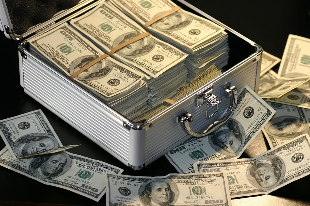 A steel case filled with money representing a downpayment for a mortgage in Kalamazoo, MI.
